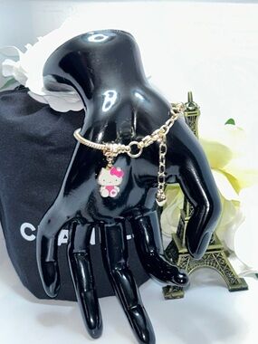 Hello Kitty Gold Bracelet with Pink and White Charm